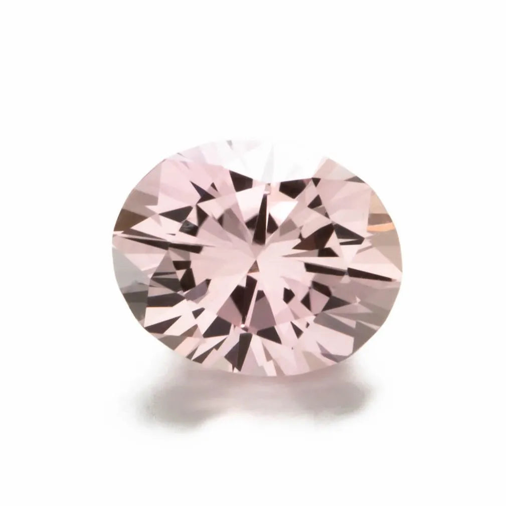 lab peach sapphire oval cut