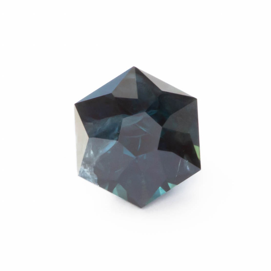 au0112 dark blue australian sapphire in a hex cut
