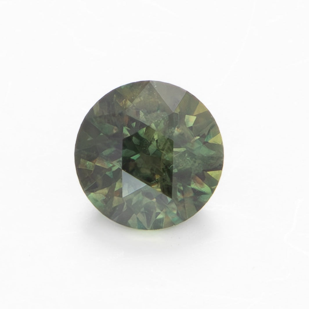 AU0121 green round australian sapphire