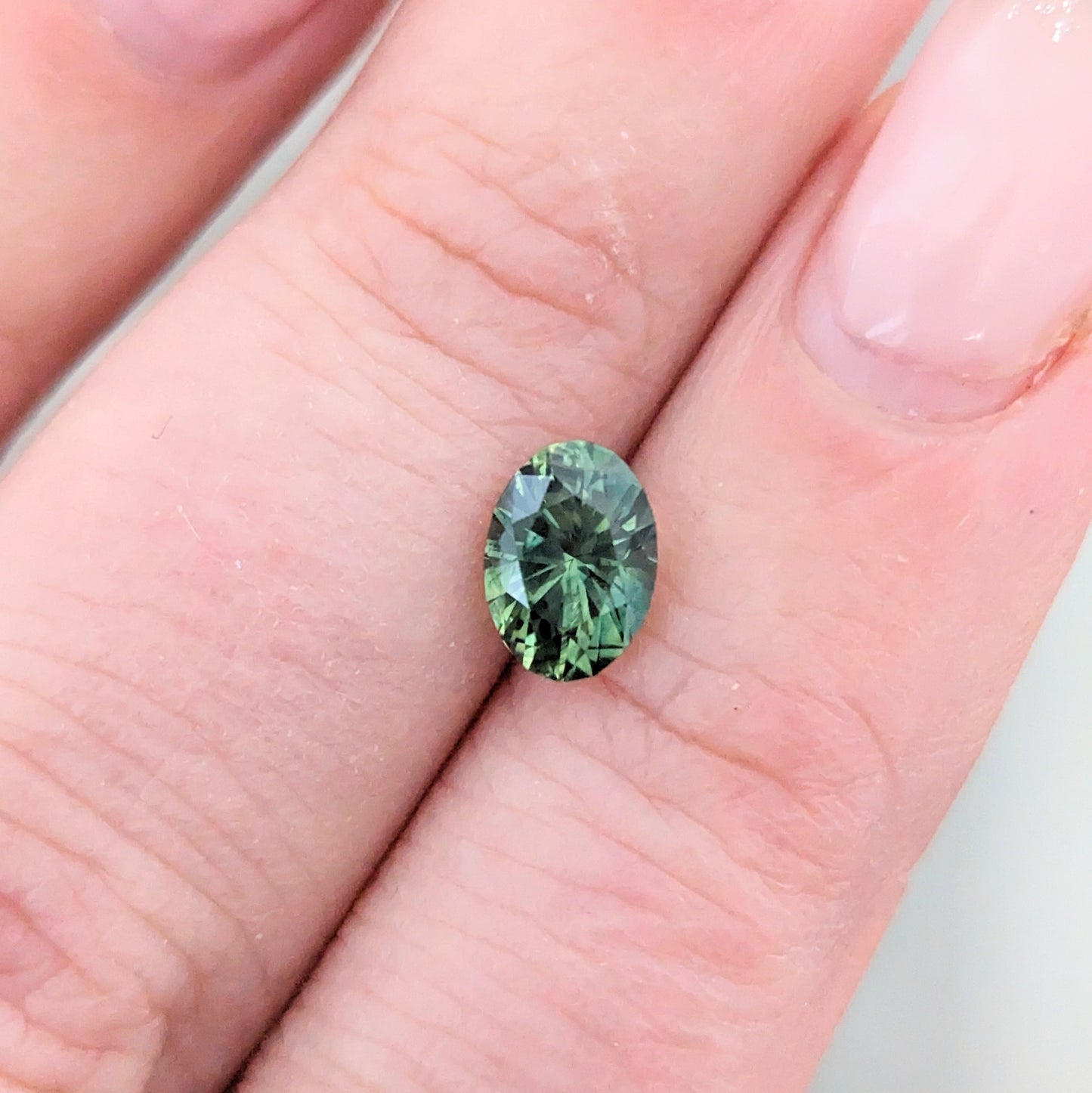 AU0130 green australian oval sapphire