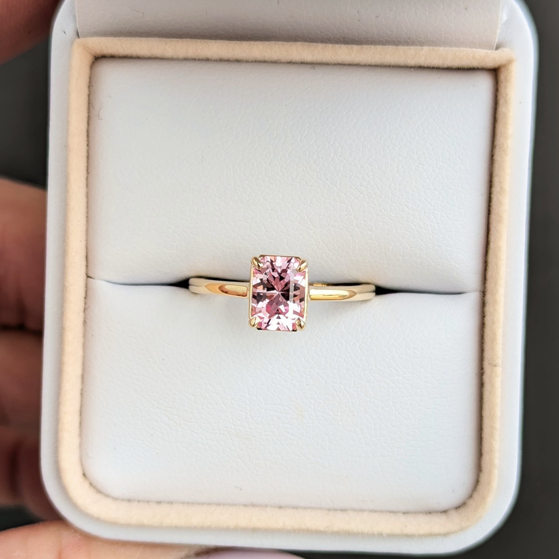 Adrienne solitaire engagement ring with radiant lab sapphire