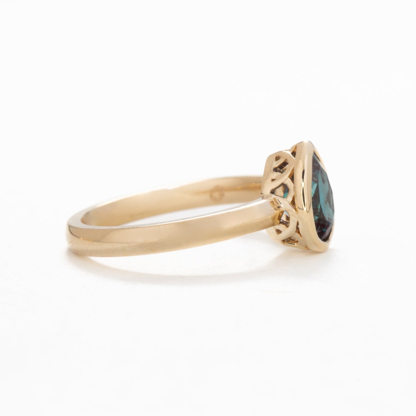 alexandra engagement ring with alexandrite pear bezel
