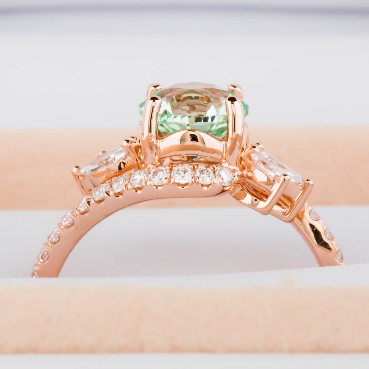 Annabelle nature inspired engagement ring with mint lab sapphire