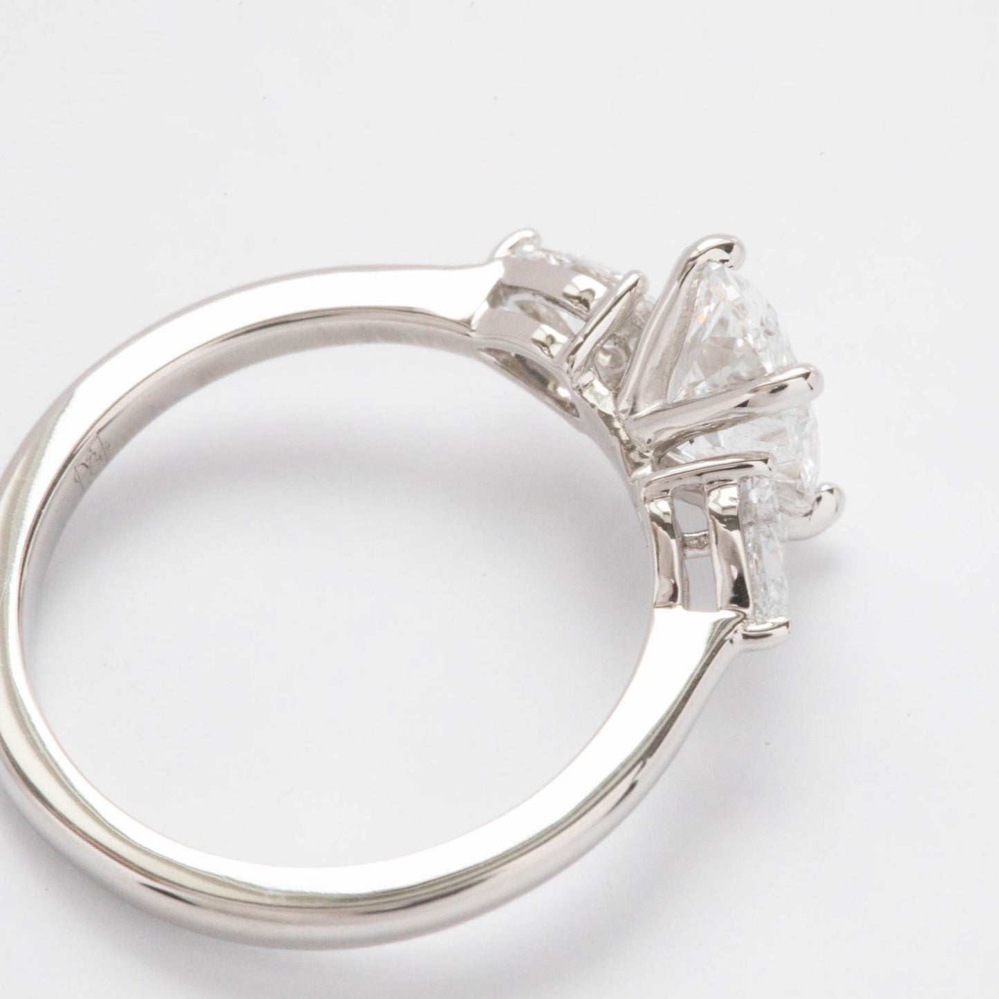 Beckett engagement ring with oval and pear lab diamonds