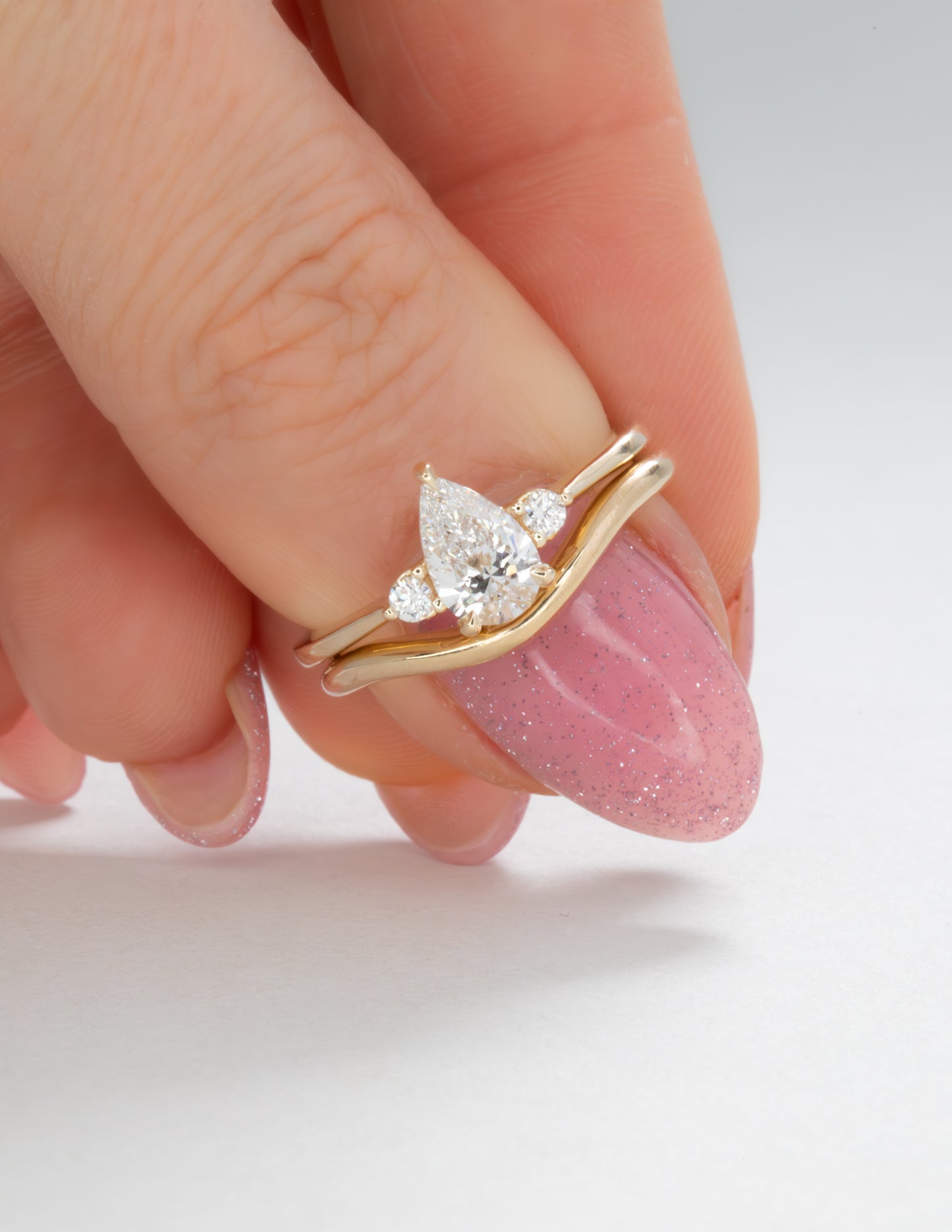 Britt engagement ring with pear lab diamond