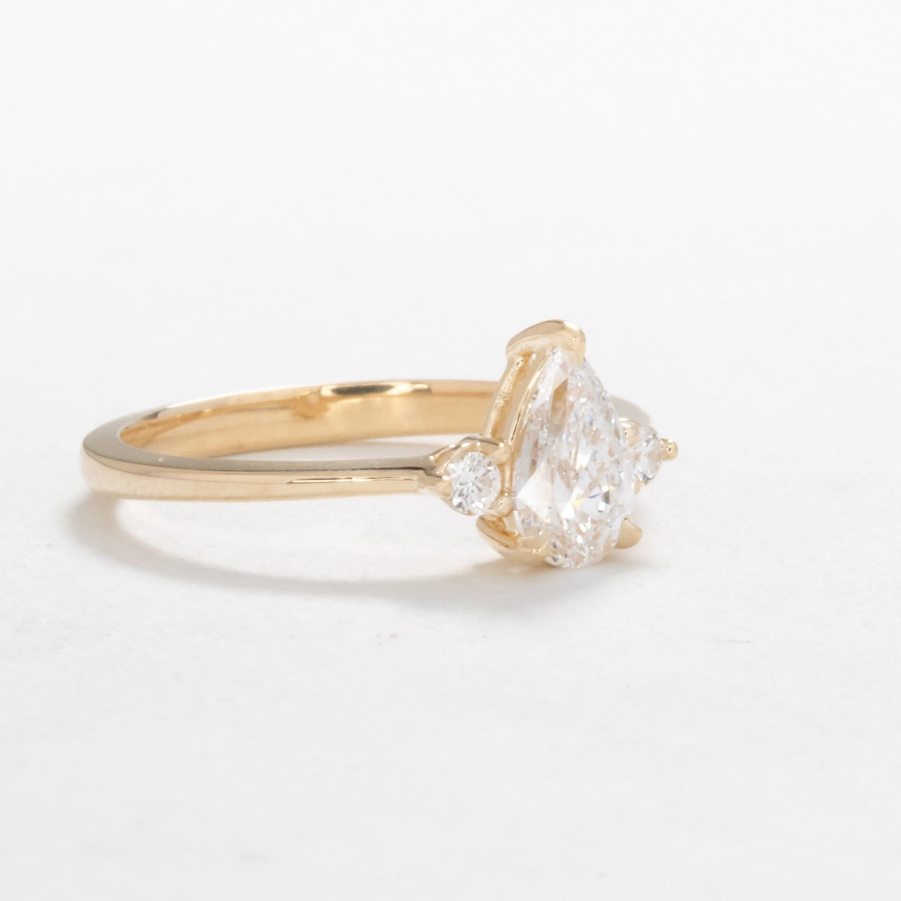 Britt engagement ring with pear lab diamond