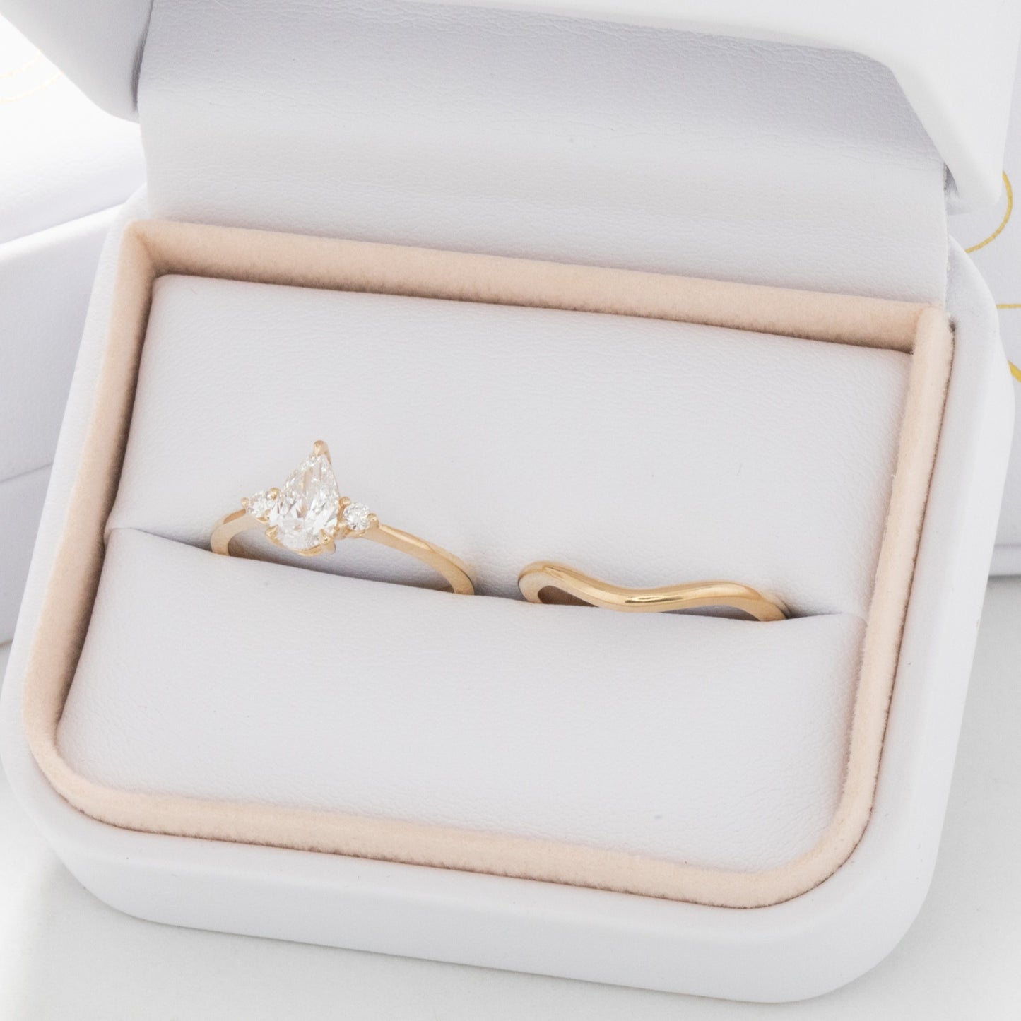 Britt engagement ring with pear lab diamond