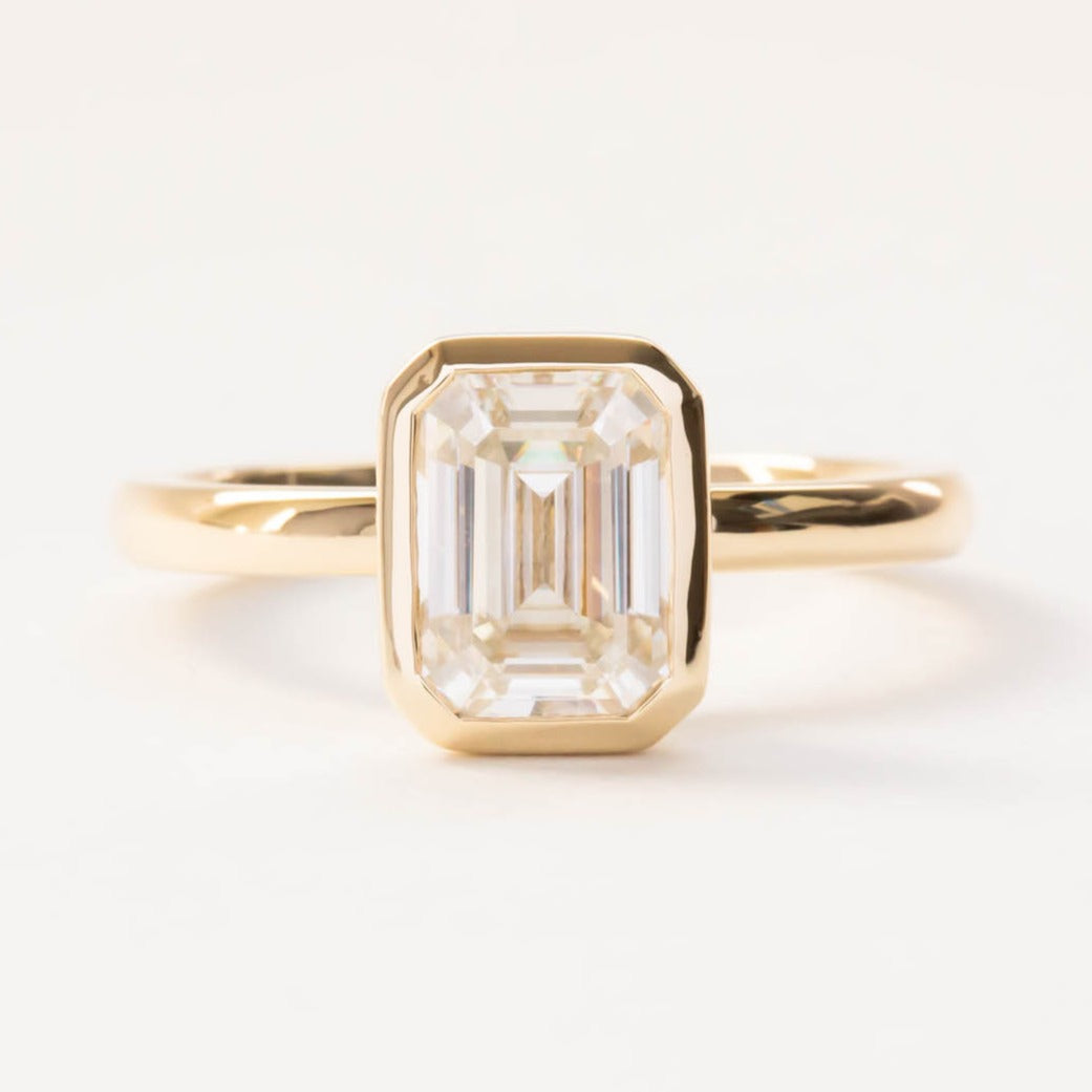 Cami solitaire engagement ring with step cut lab sapphire