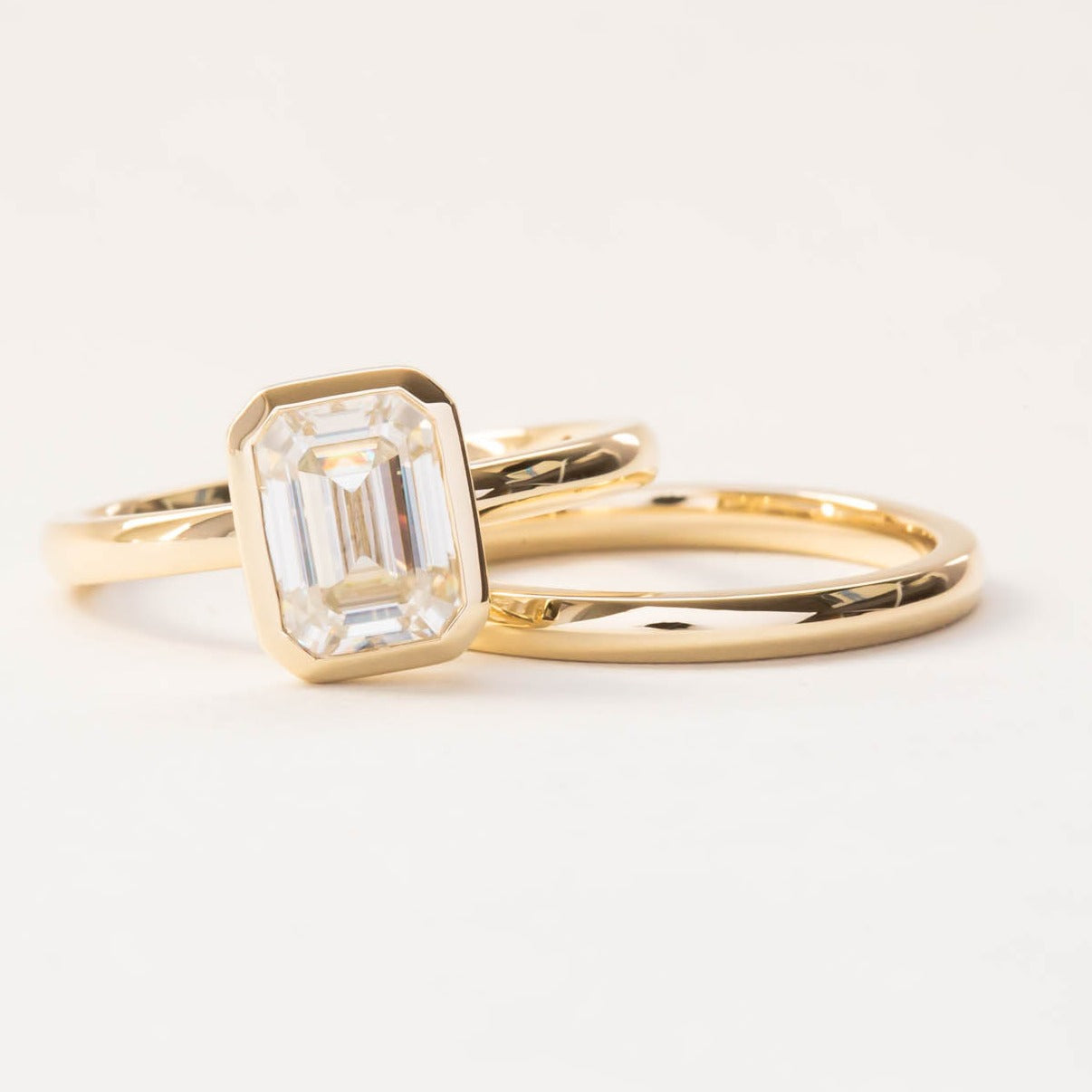 Cami solitaire engagement ring with step cut lab sapphire