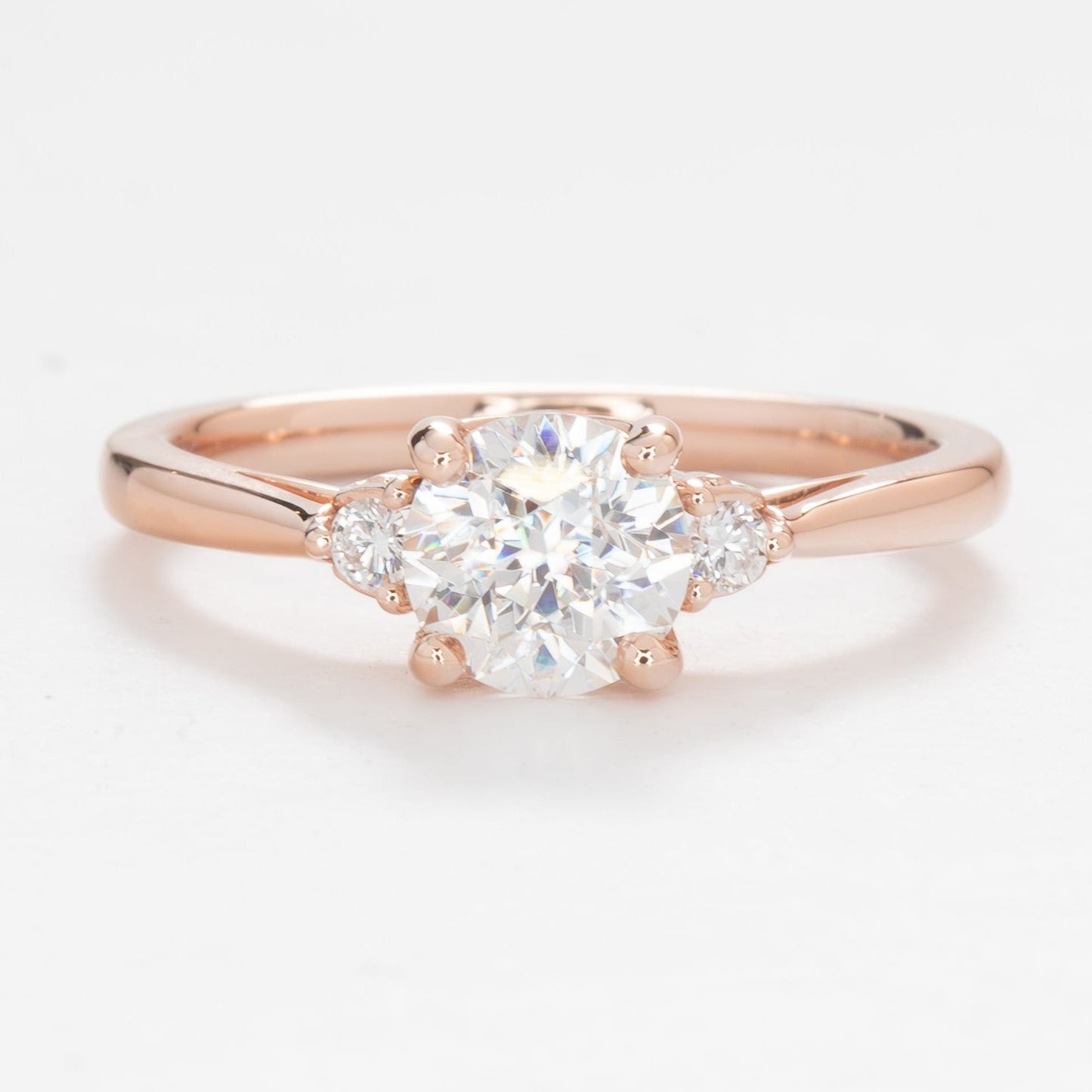 Carina three stone ring with white lab sapphire