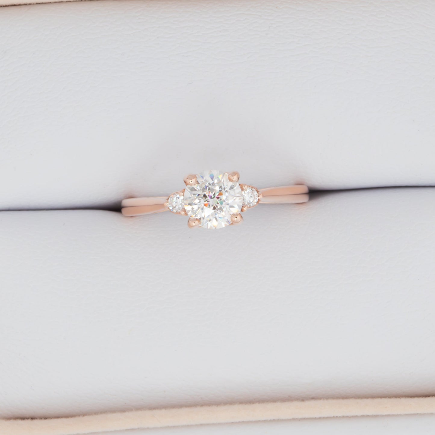 Carina three stone ring with white lab sapphire