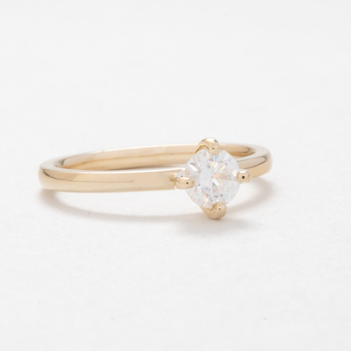 Compass solitaire moissanite enagement ring