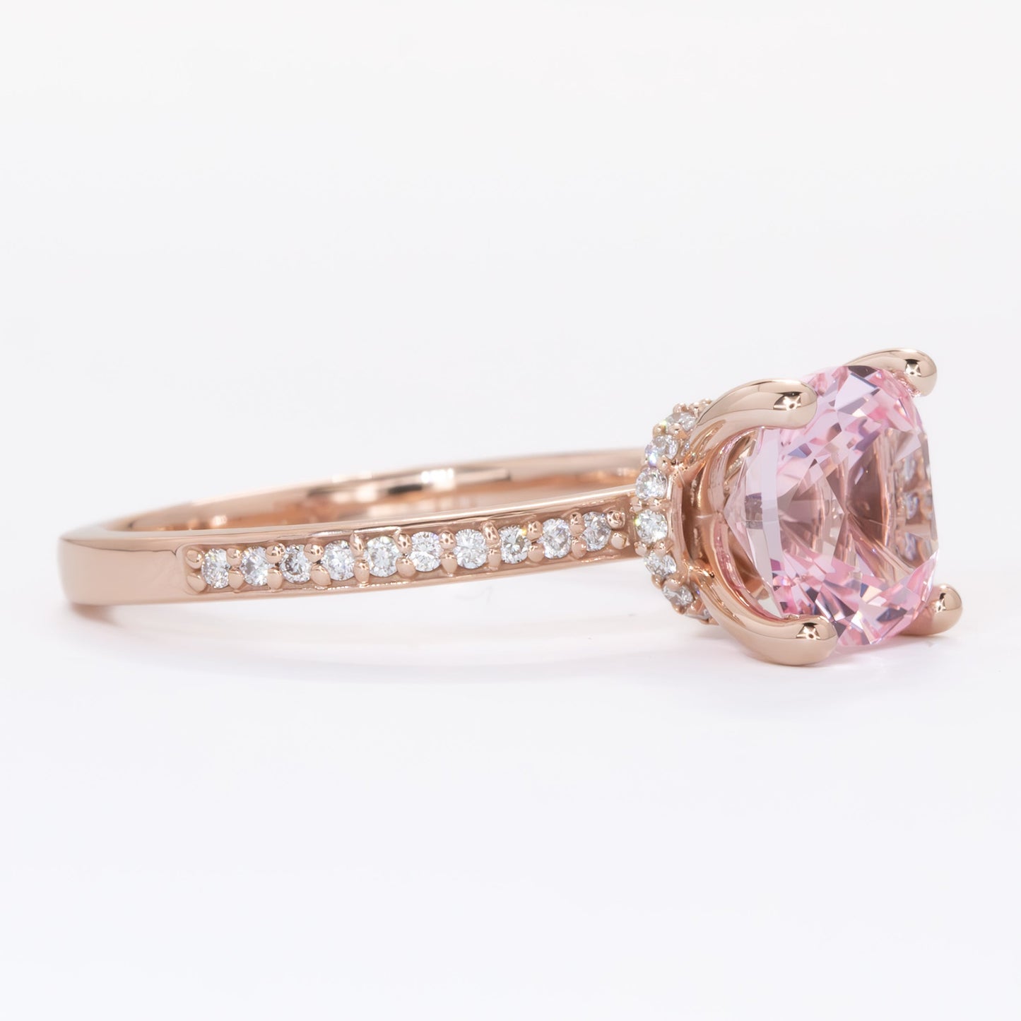 Kira hidden halo engagement ring with peach lab sapphire cushion