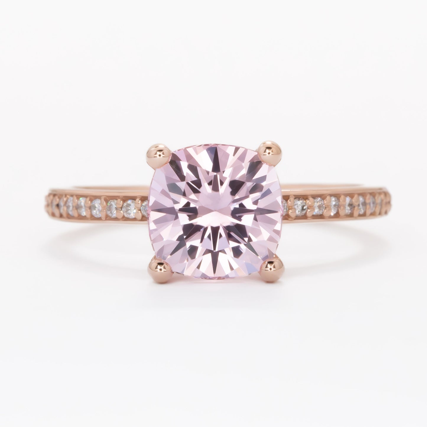 Kira hidden halo engagement ring with peach lab sapphire cushion