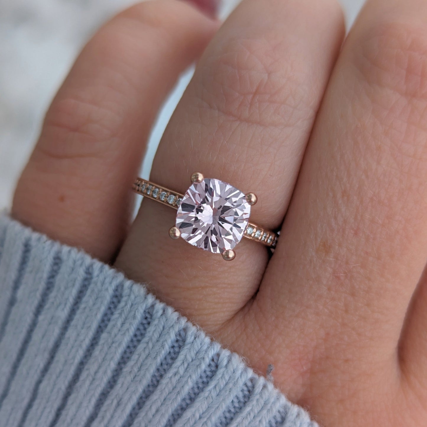 Kira hidden halo engagement ring with peach lab sapphire cushion