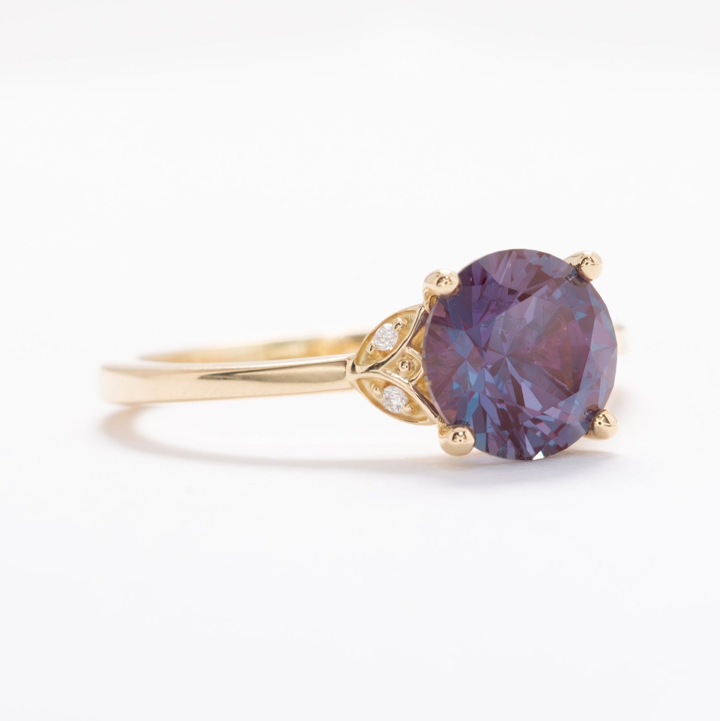 Krystal floral inspired engagement ring with lab alexandrite