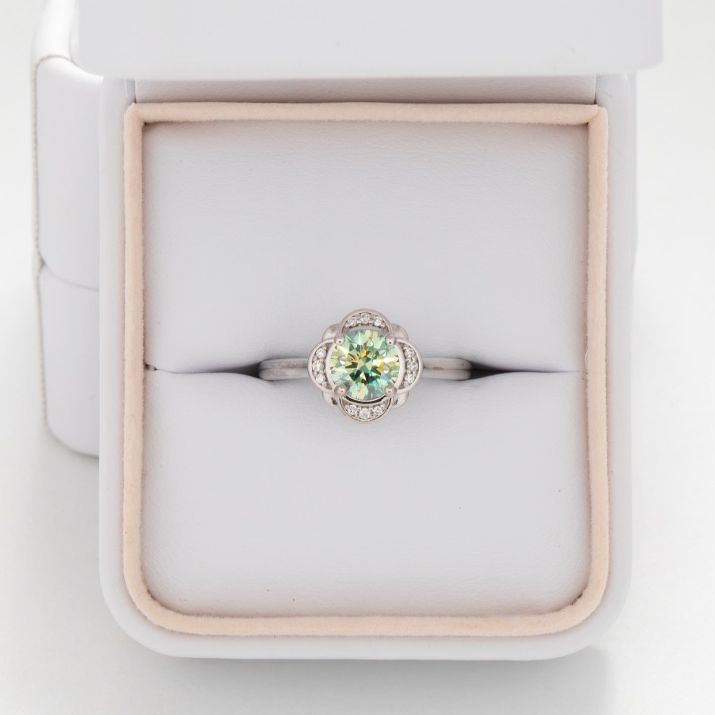 Lalita halo nature inspired engagement ring with teal moissanite