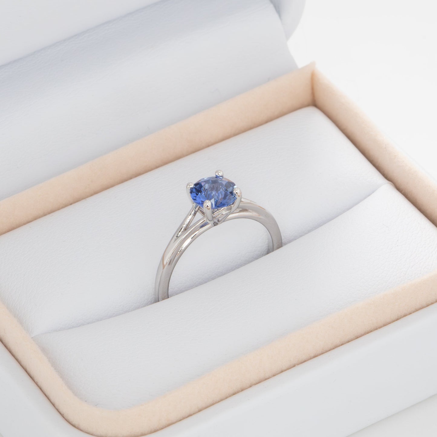 Neve split shank solitaire ring with blue lab sapphire