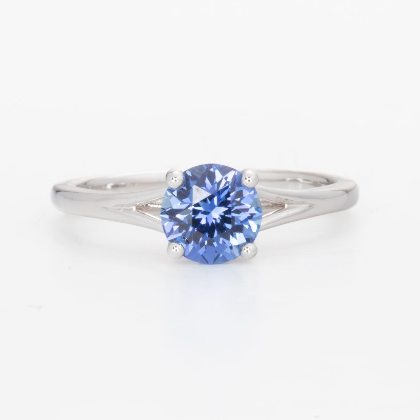 Neve split shank solitaire ring with blue lab sapphire