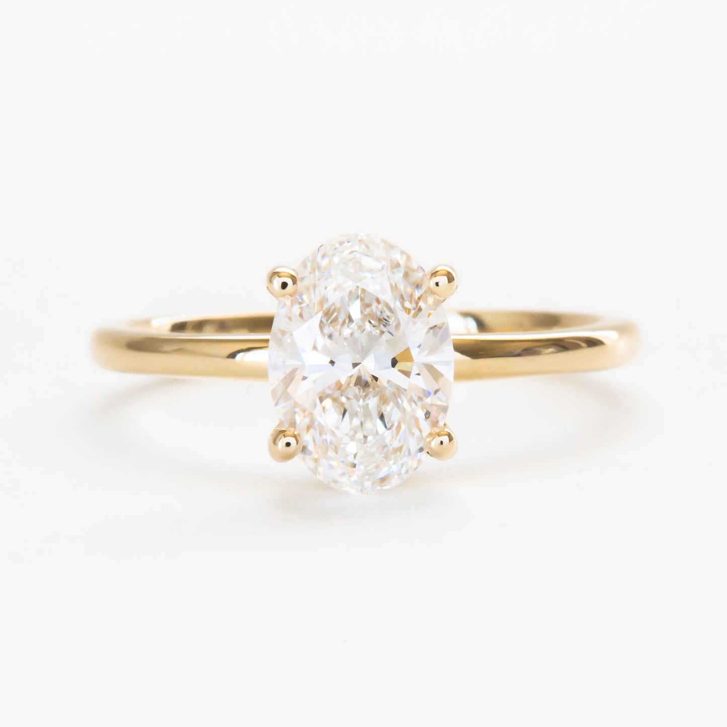 Oval lab diamond hidden halo engagement ring