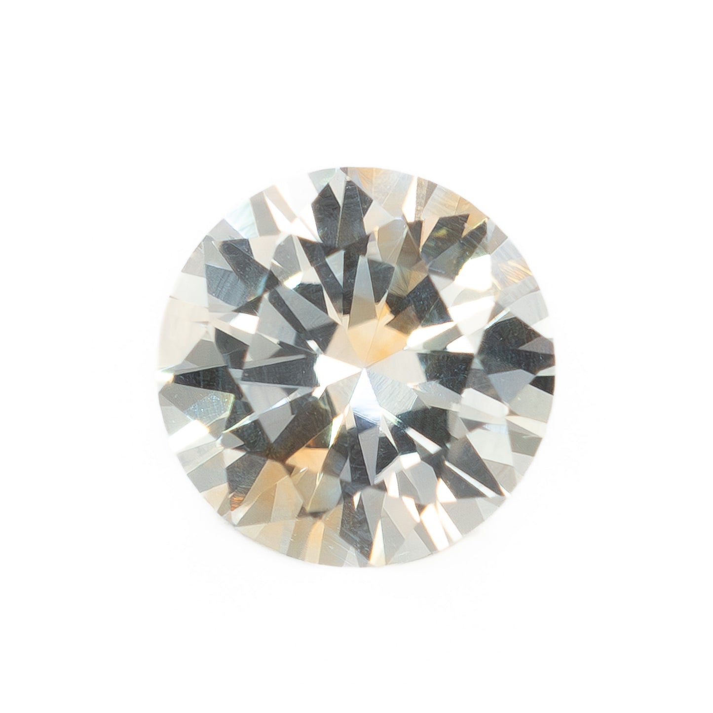 PSH0823 0.78ct yellow and white parti color round brilliant montana sapphire