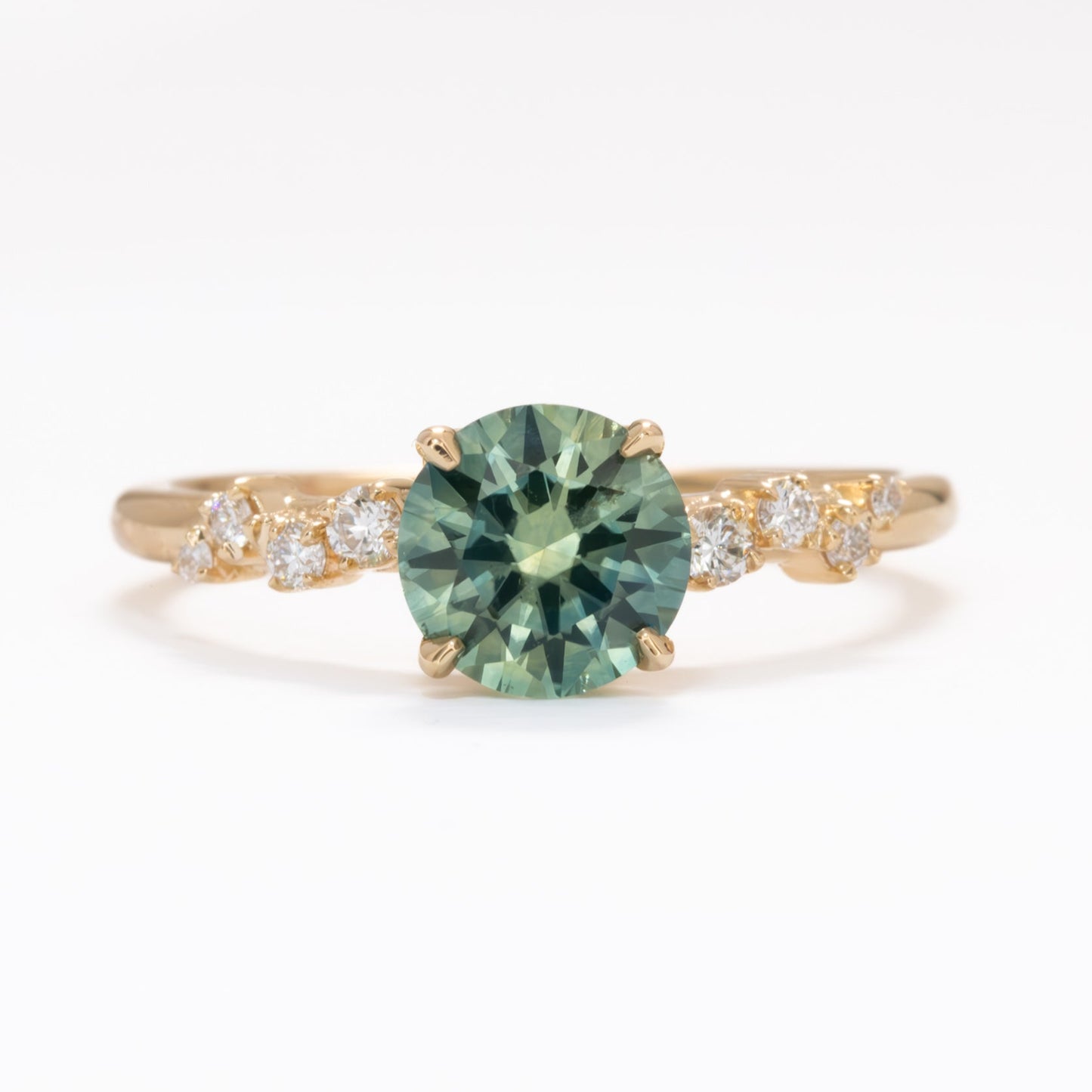 Penolope engagement ring with round sapphire