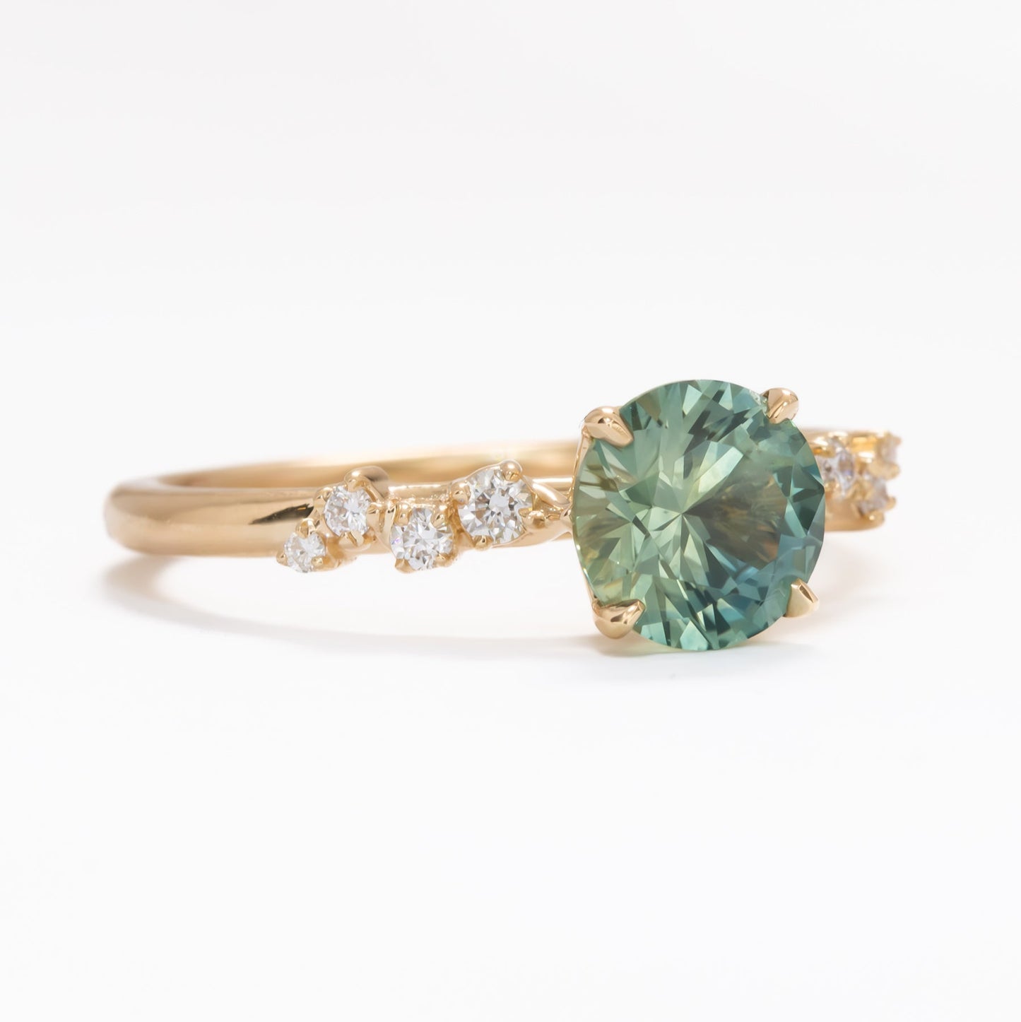 Penolope engagement ring with round sapphire