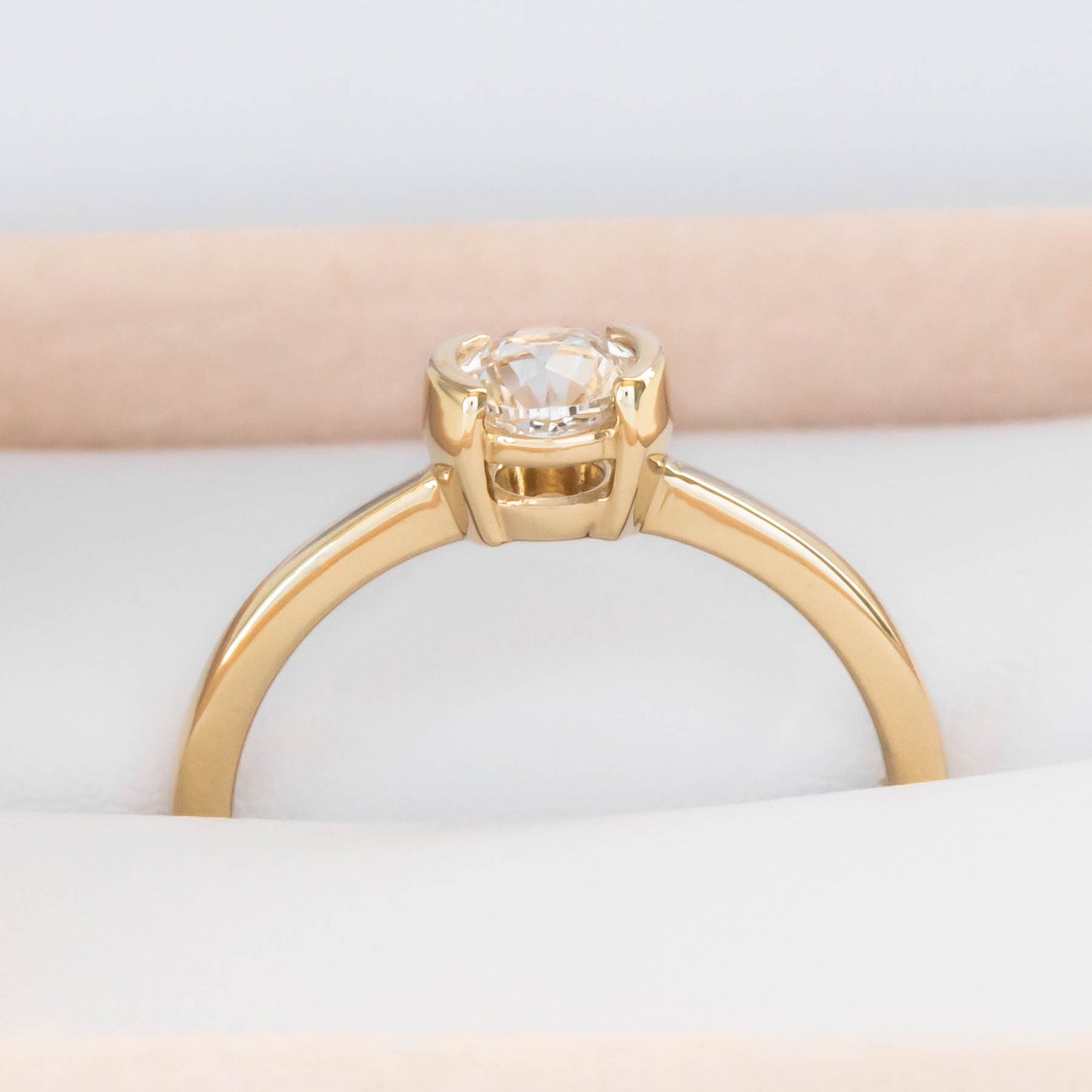 Reese half bezel solitaire engagement ring with lab sapphire
