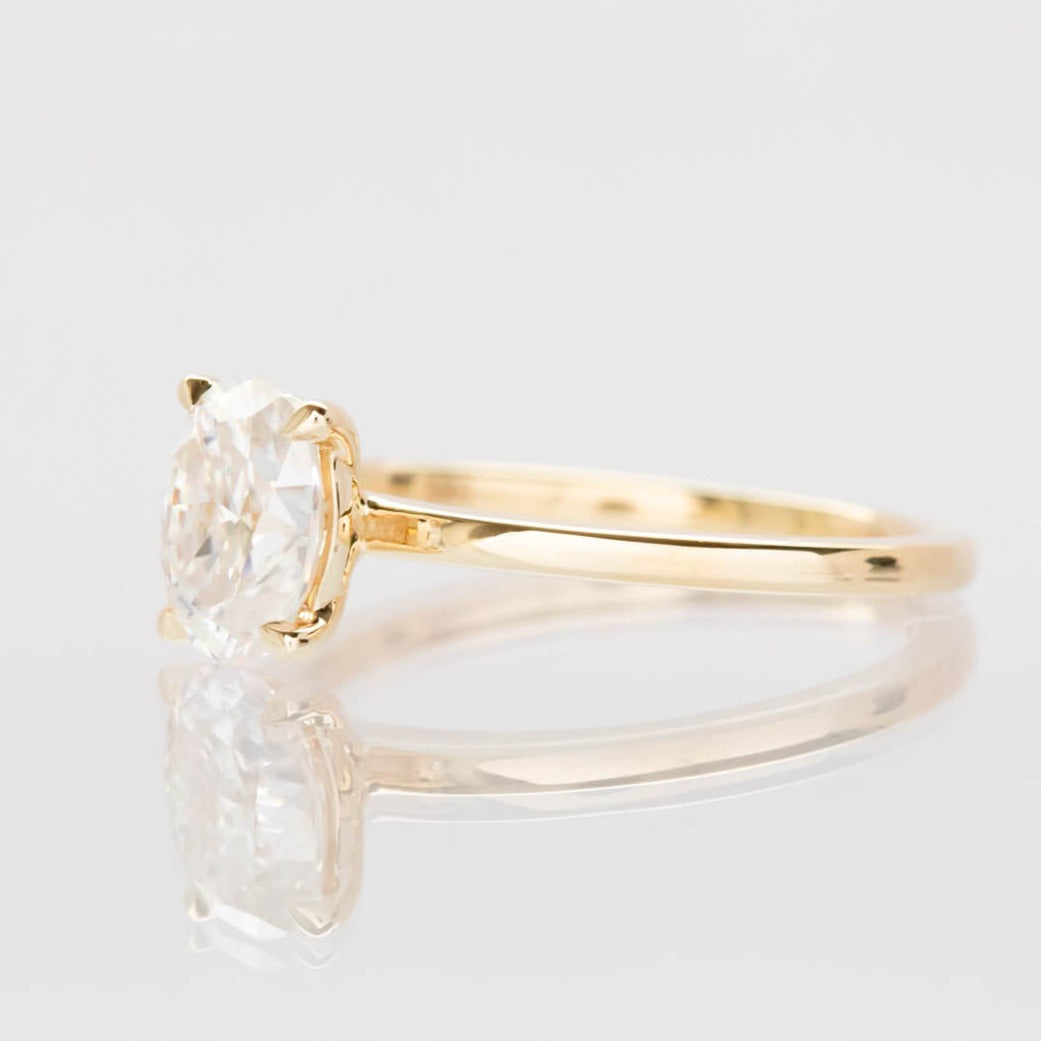 Serene solitaire engagement ring with oval moissanite
