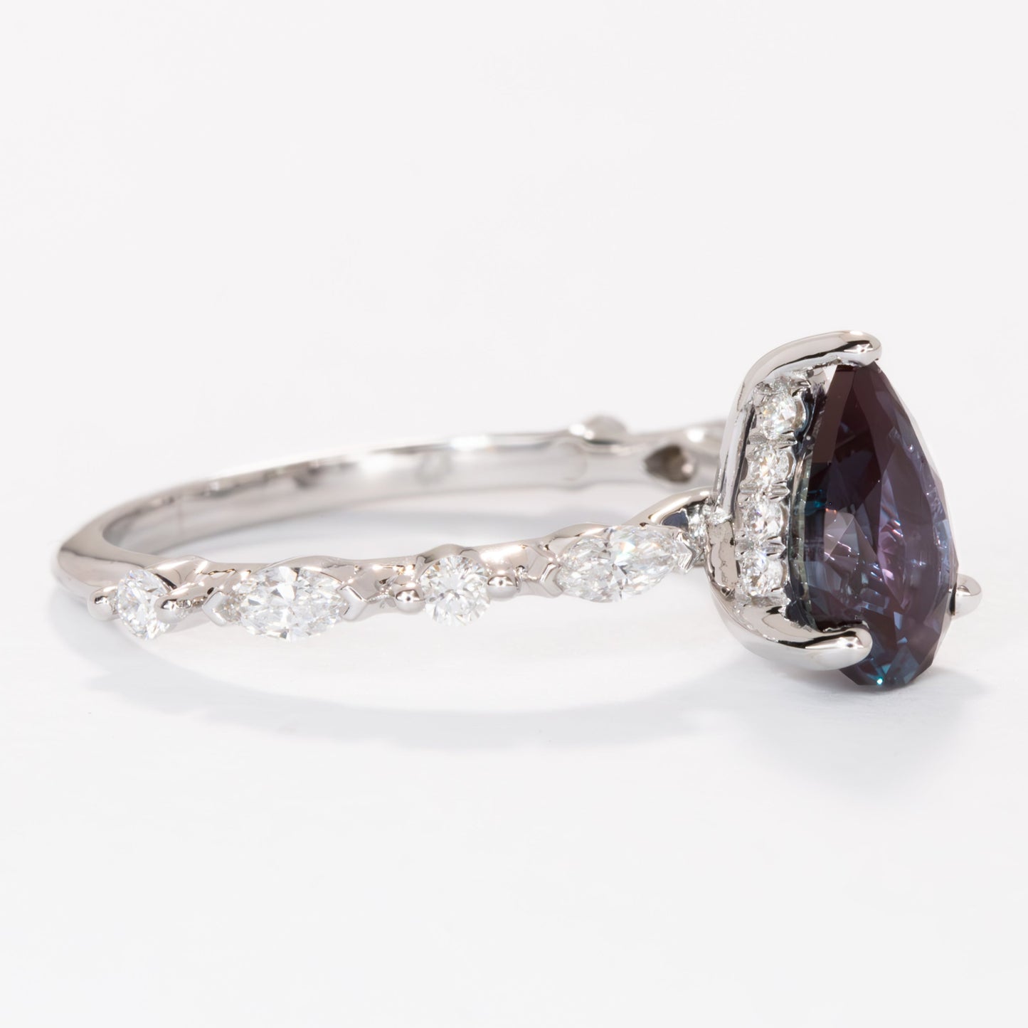 Wren engagement ring with lab diamonds and pear lab alexandrite