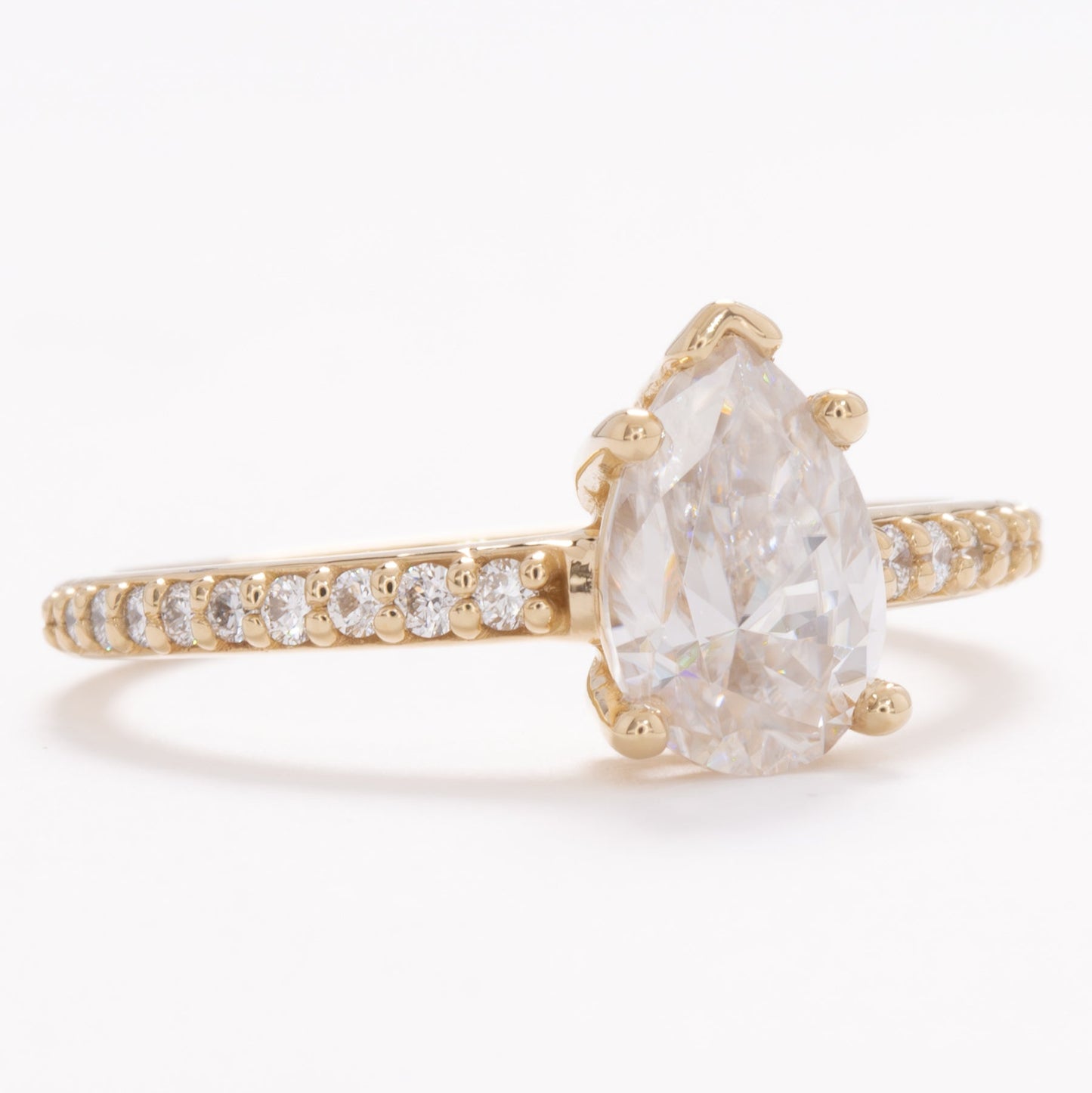 accented liv engagement ring with pear moissanite