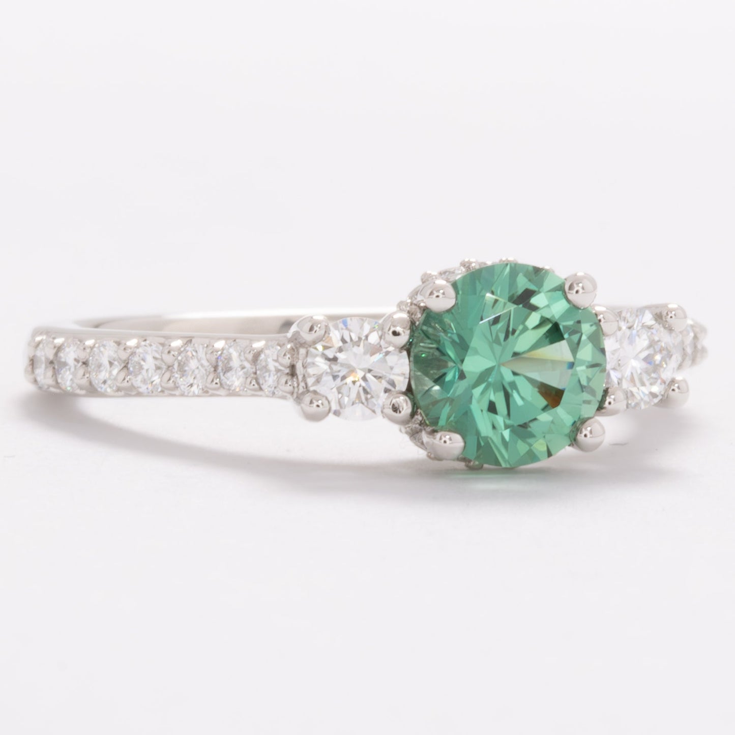 addison three stone engagement ring with green lab sapphire round