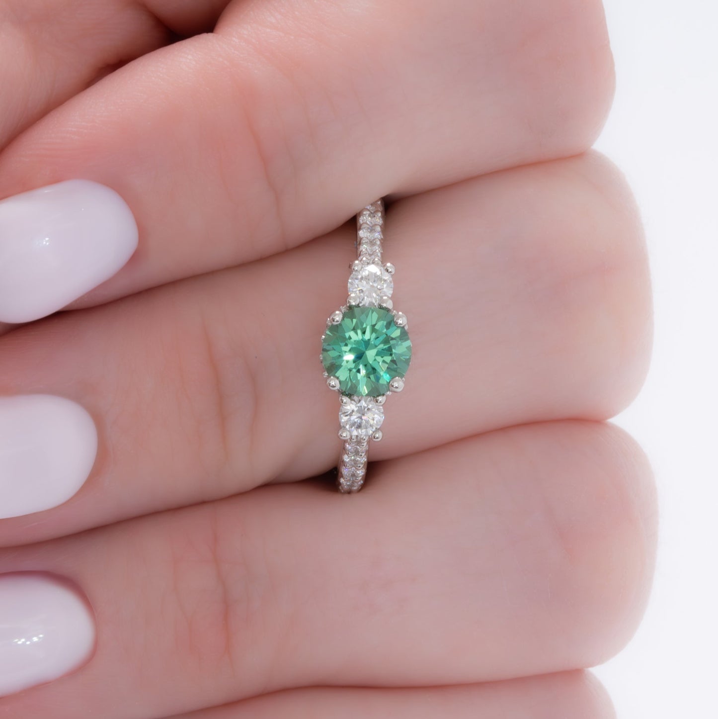 addison three stone engagement ring with green lab sapphire round