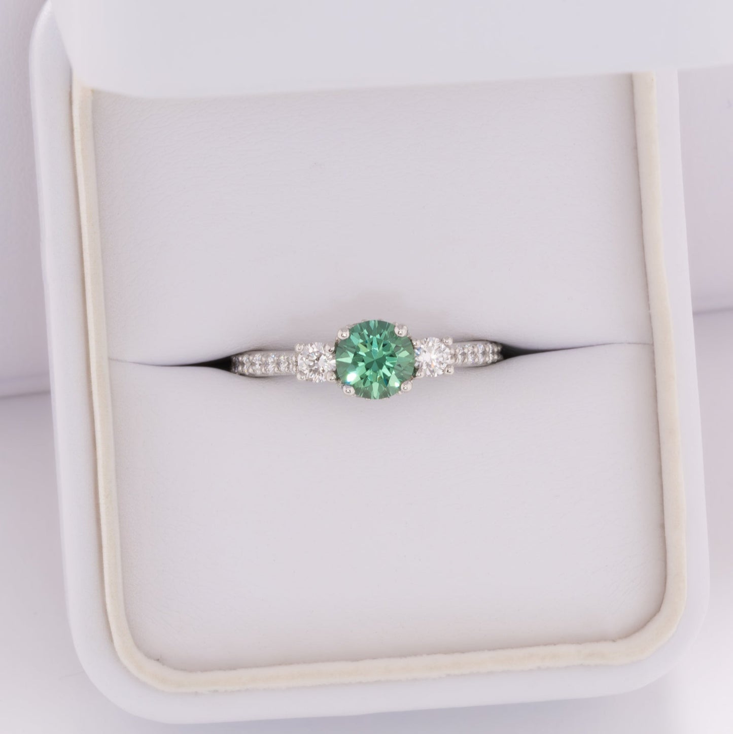 addison three stone engagement ring with green lab sapphire round