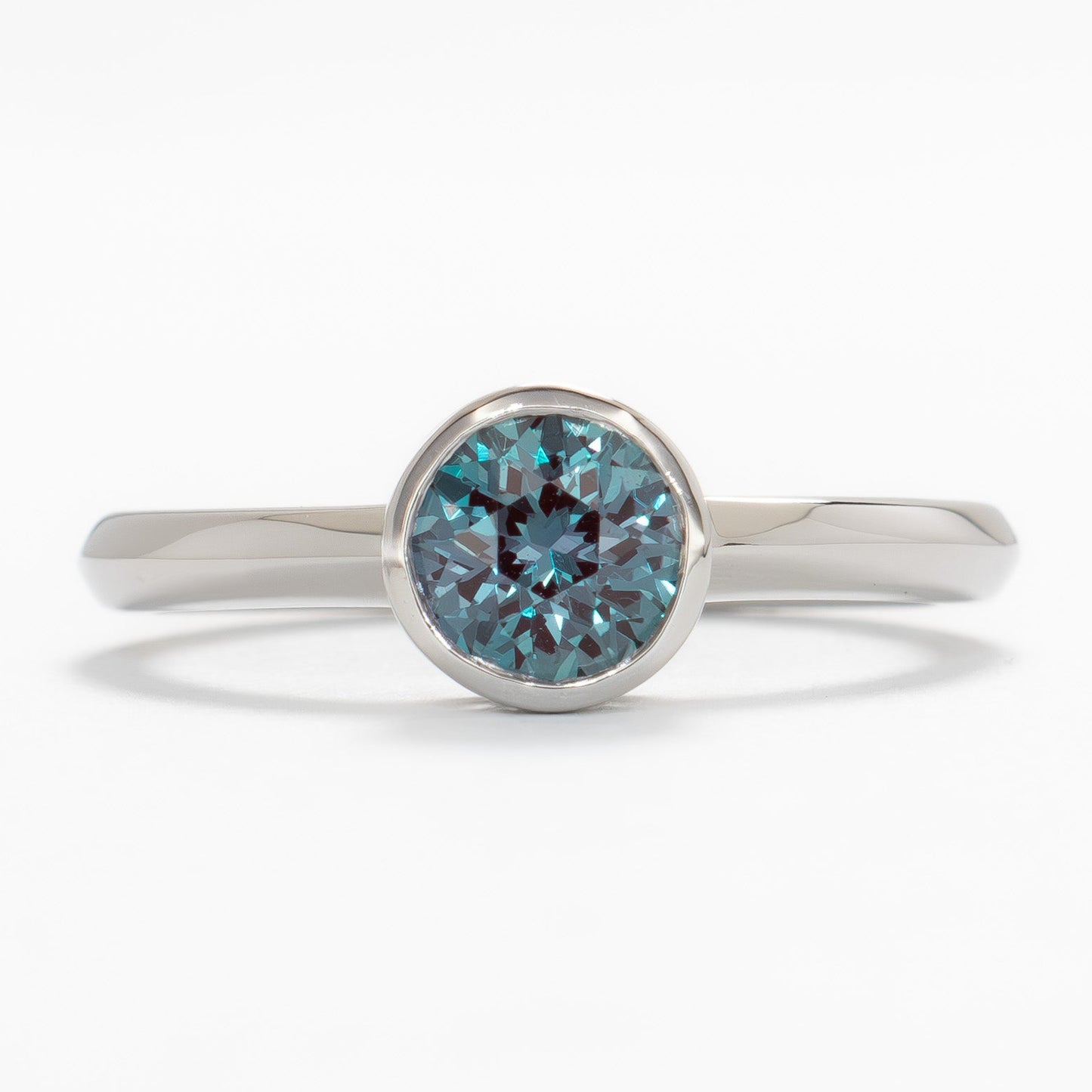 alexandra bezel set solitaire with round lab alexandrite
