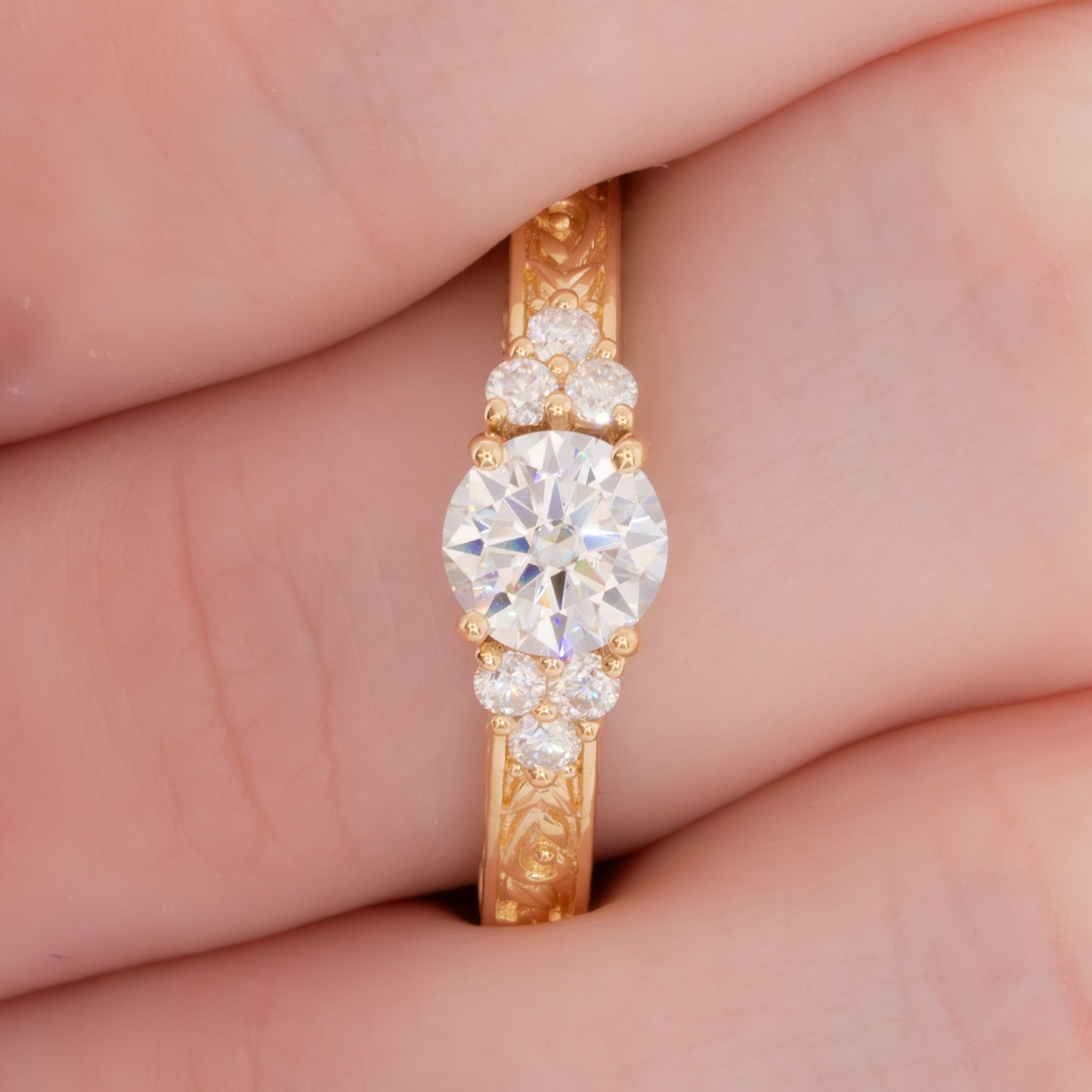 alice ring in yellow gold with round moissanite