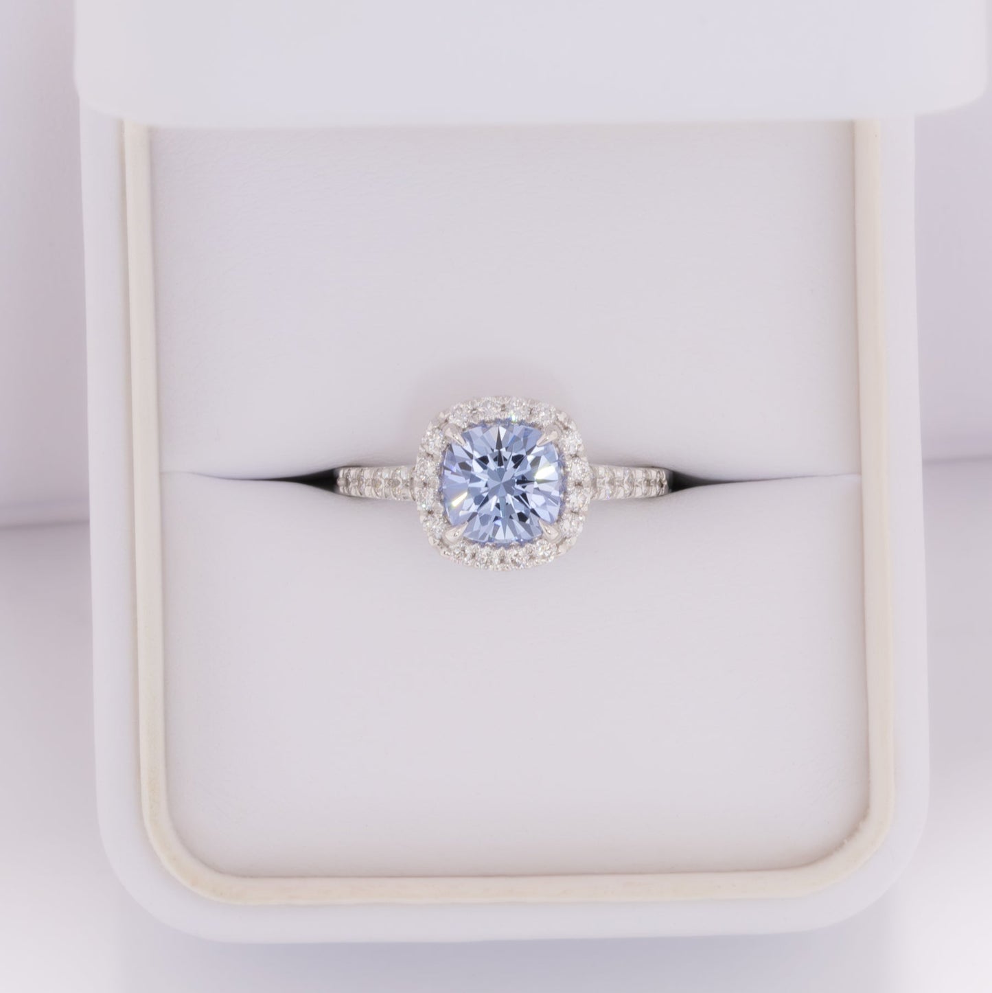 athena halo engagement ring with cushion blue lab sapphire