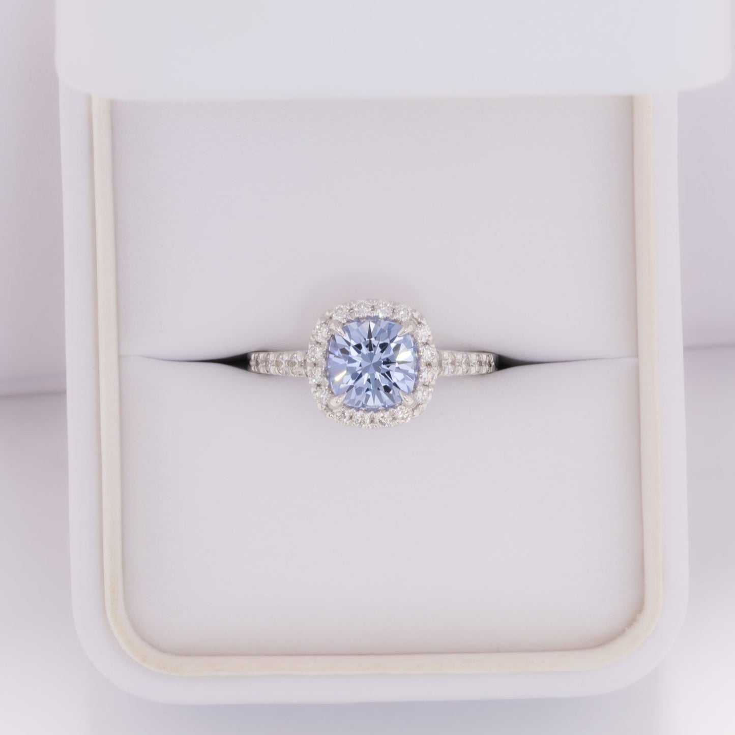 athena halo engagement ring with cushion blue lab sapphire