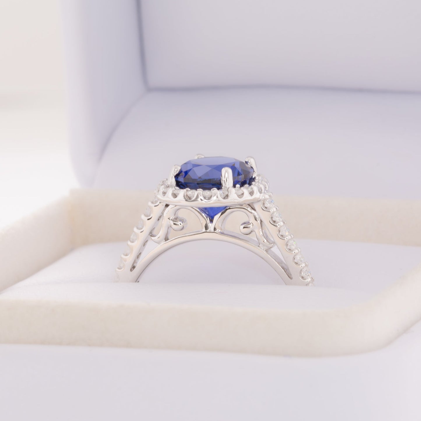 brynn halo engagement ring with royal blue oval lab sapphire
