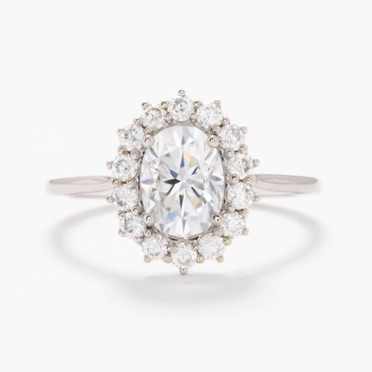 calypso halo engagement ring with white moissanite