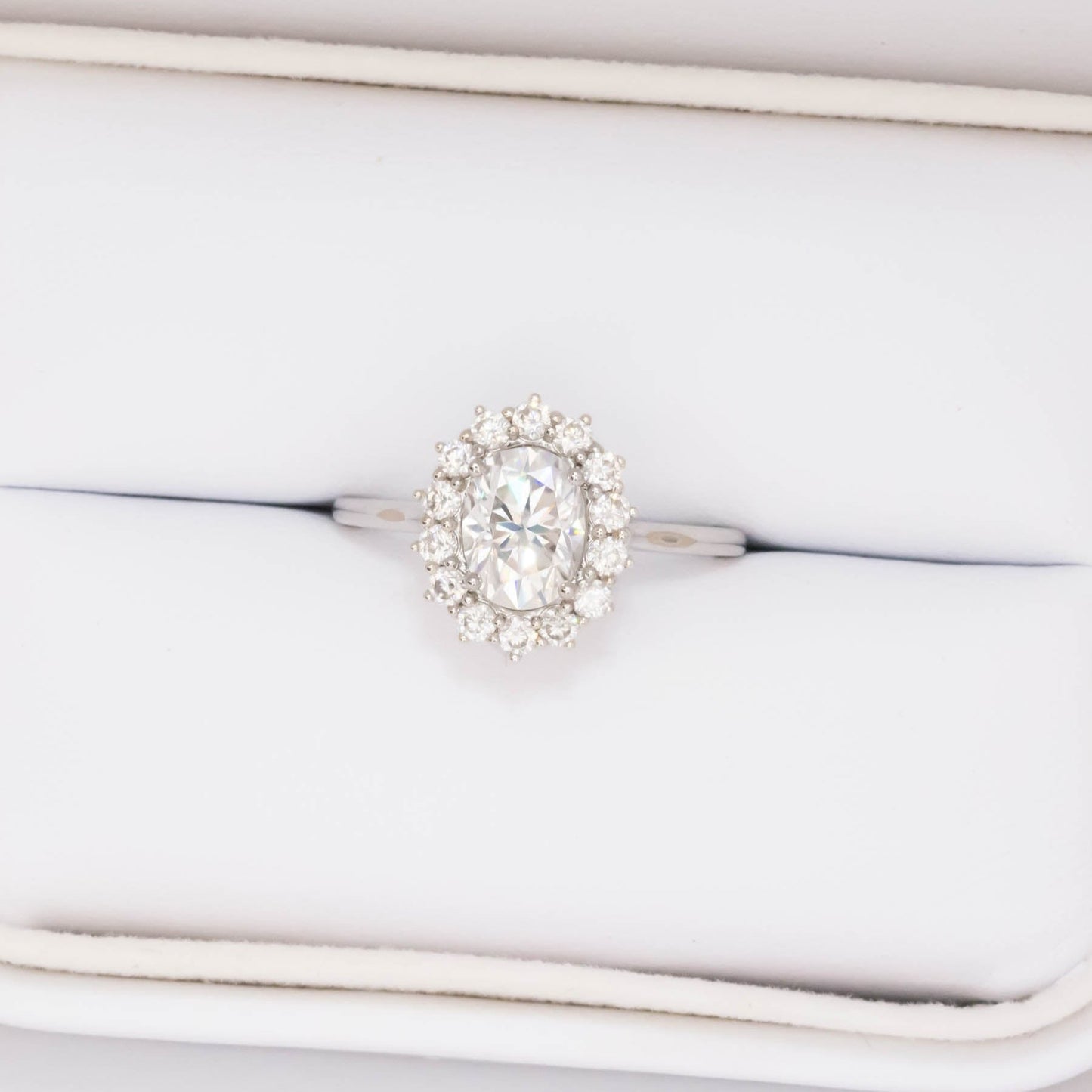 calypso halo engagement ring with white moissanite