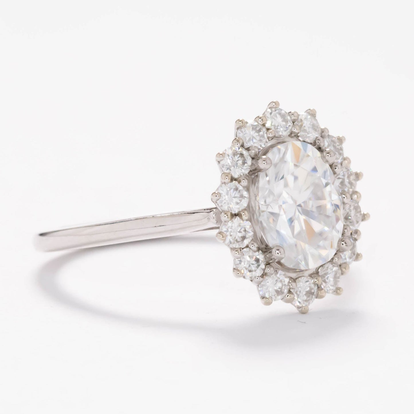 calypso halo engagement ring with white moissanite