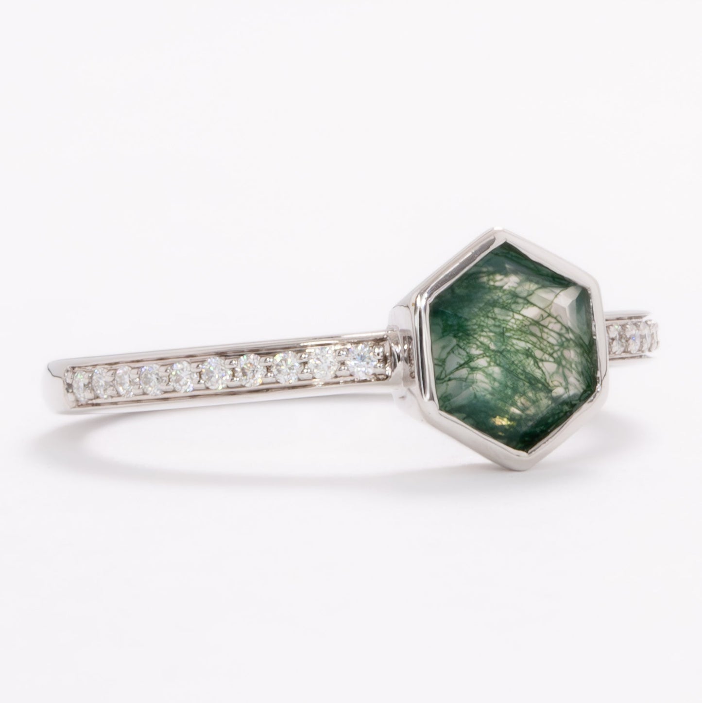 carol bezel set accented engagement ring with hex cut moss agate