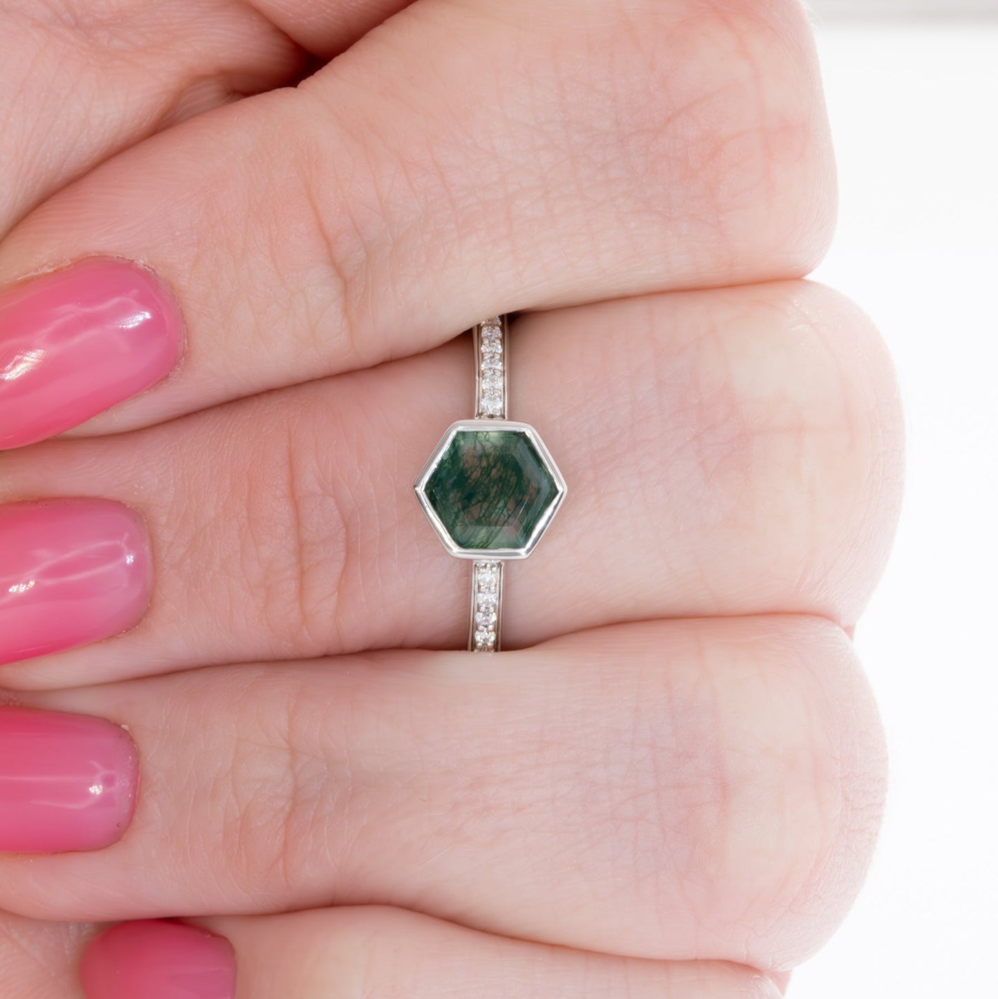 carol bezel set accented engagement ring with hex cut moss agate