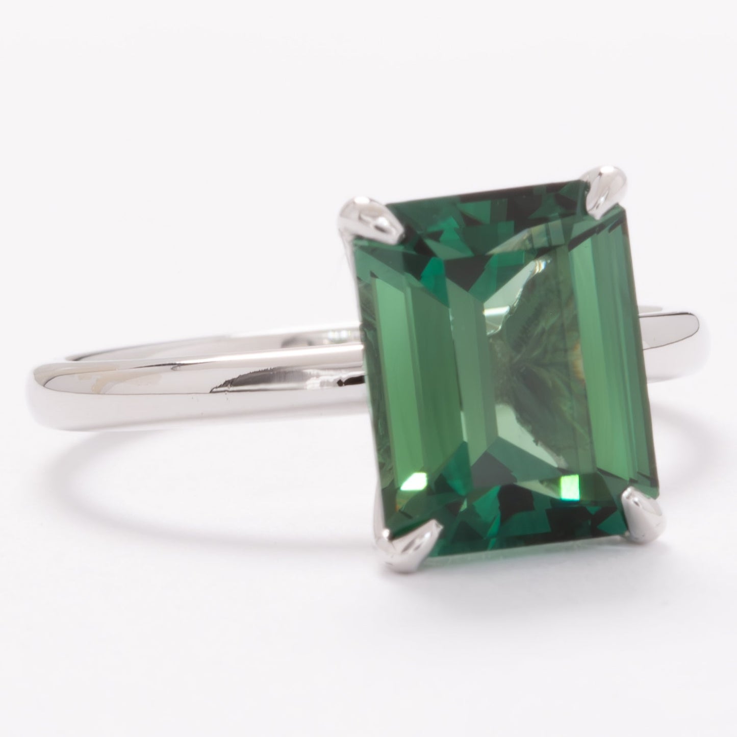 charmaine solitaire ring with green lab sapphire step cut