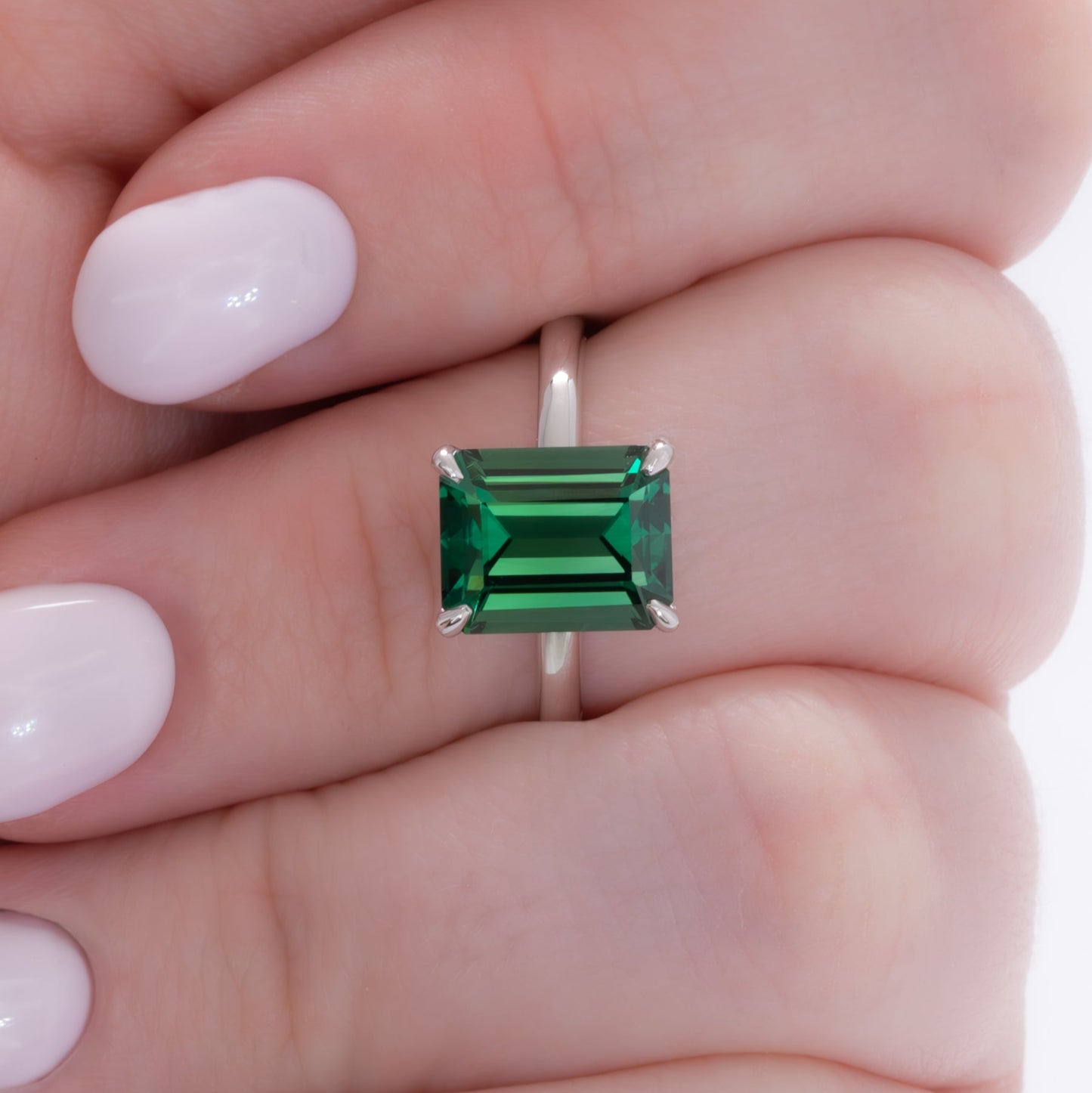 charmaine solitaire ring with green lab sapphire step cut