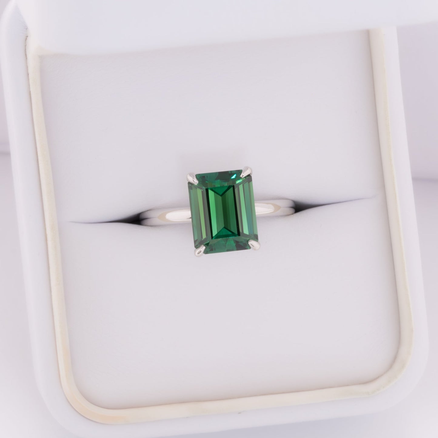 charmaine solitaire ring with green lab sapphire step cut