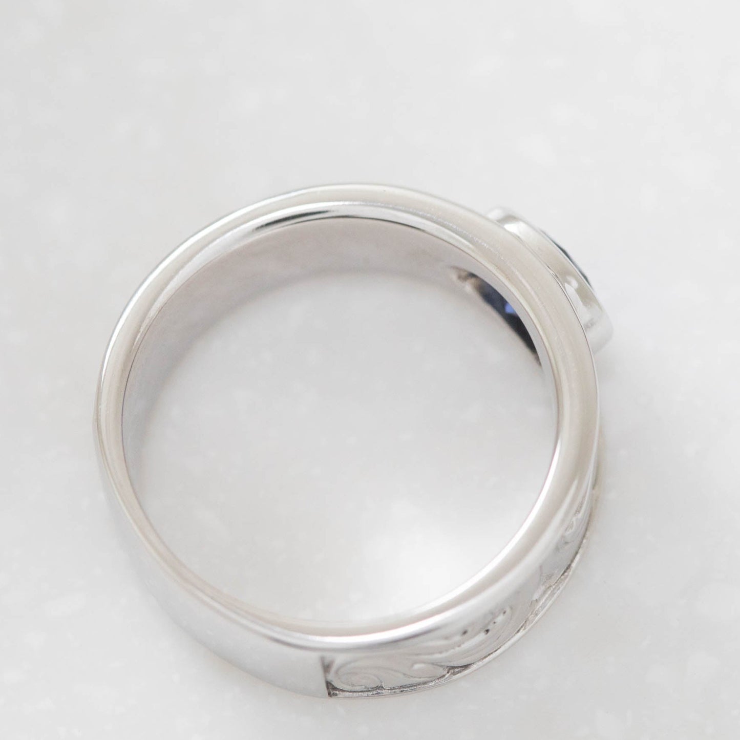 custom men's band with oval blue lab sapphire