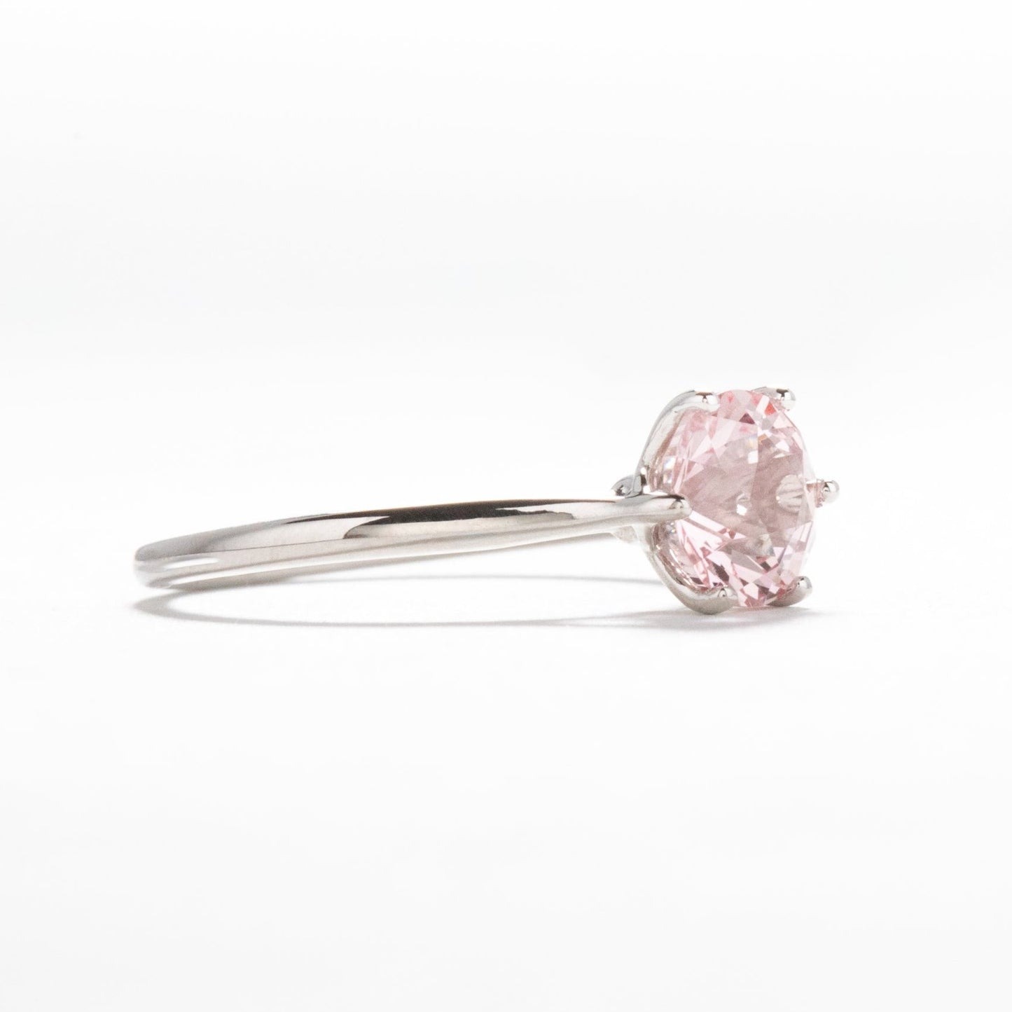 daphnis engagement ring with peach lab sapphire