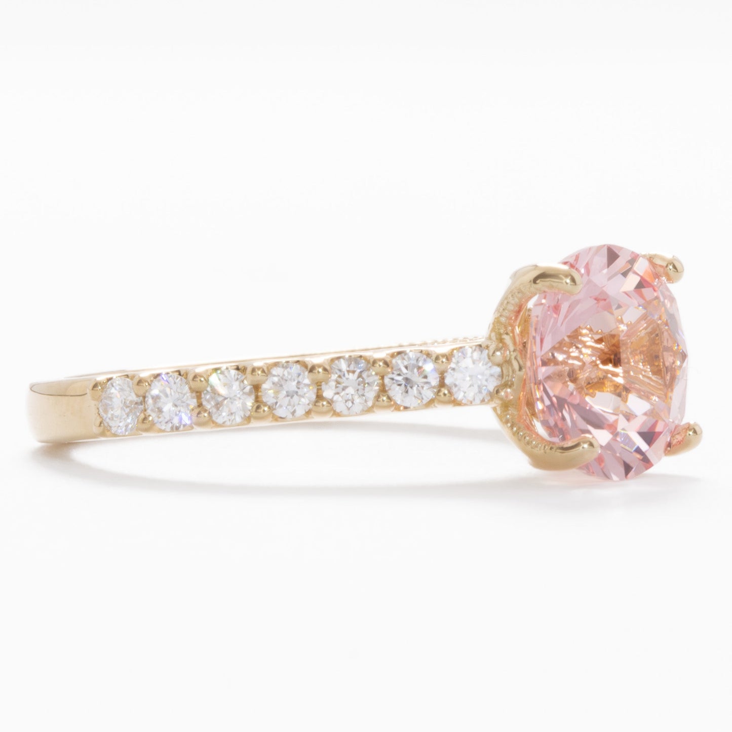della engagement ring with round pink lab sapphire